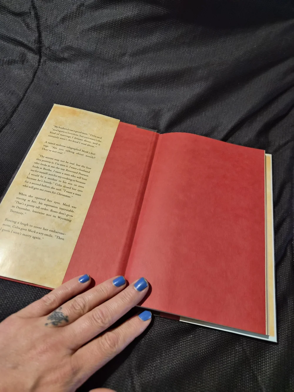 Christmas Roses by Amanda Cabot - Red Hardcover Book